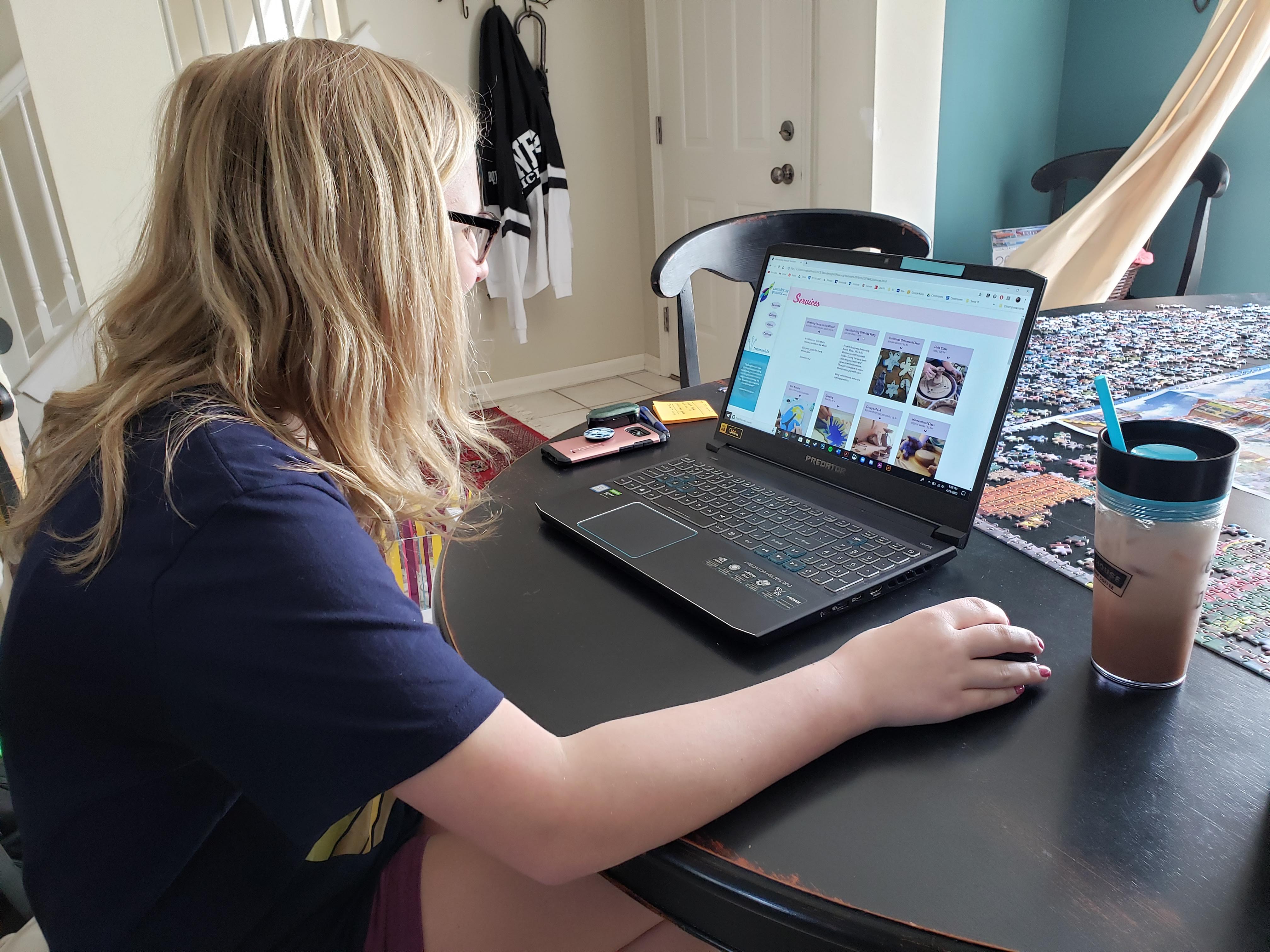 Usability testing The Wandering Peacock website on a laptop